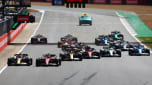 Formula 1 cars crossing the line